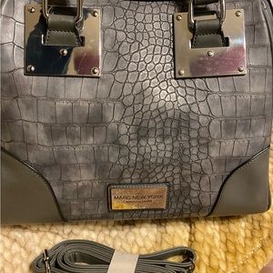 Gray satchel handbag.